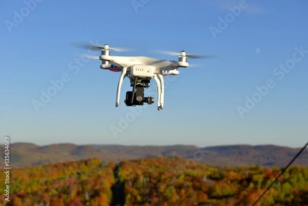 Fototapeta Drone récréatif en vol en fin de journée