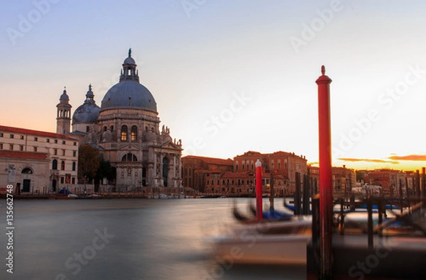 Obraz Grand canal in Venice during beautiful  sunset with parked gondolas in front