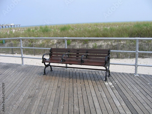Fototapeta empty boardwalk bench
