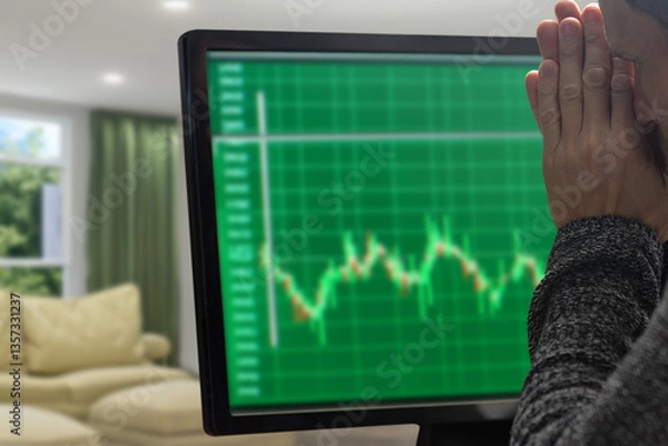 Obraz Worried male trader using pc computer and analyzing digital stock market graphs. Unrecognizable man engaged in trading, emotions on display, analyzing charts on monitor