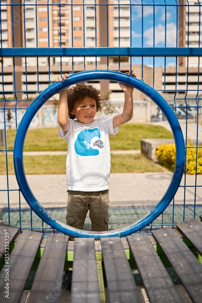 Obraz Child taking a break while playing on a playground