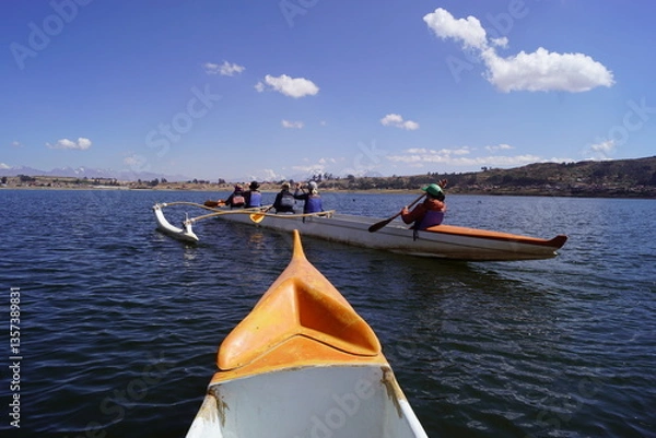 Obraz Kayaking in Polynesian kayaks in the Laguna Piuray lake surrounded by the andes mountains near Cusco, Peru