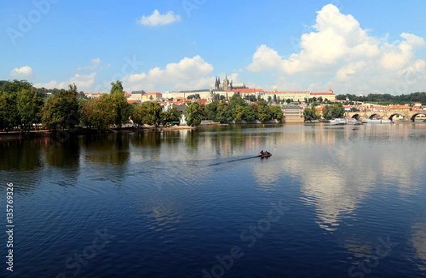 Fototapeta View of Lesser Town (Malá Strana), St. Vitus Cathedral, and Charles Bridge. Photographed from Legion Bridge looking northwest across the Vltava River.