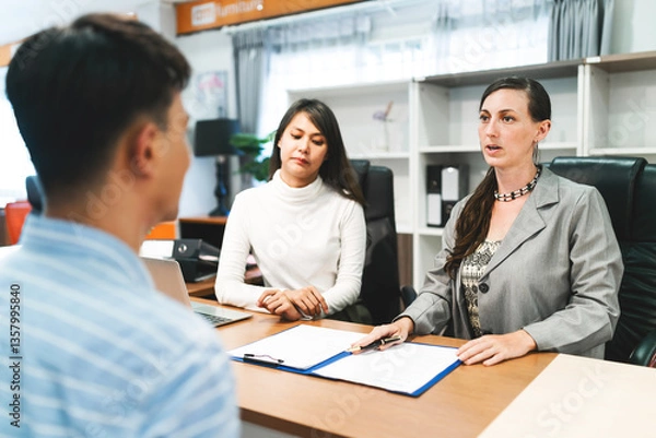 Obraz business caucasian and asian woman interview. professional human resource consider candidate for organization work. female office manager make decision for new recruitment looking good for company