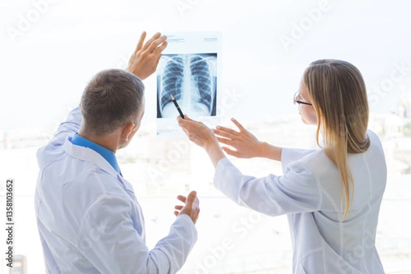 Fototapeta a group of doctors are meeting in a hospital