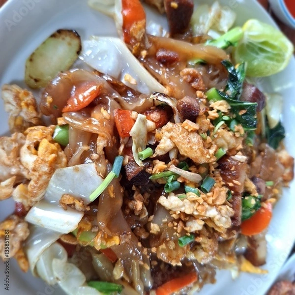 Fototapeta Stir-fried Rice Noodles with Soy Sauce and Pork