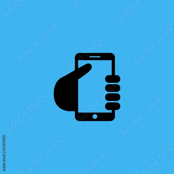 Fototapeta Mobile phone in hand icon. flat design