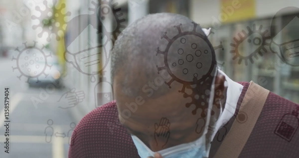 Obraz Image of covid 19 icons over african american man sneezing wearing face mask