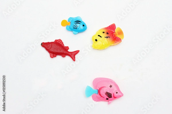 Obraz Children's toy plastic multi-colored fish.