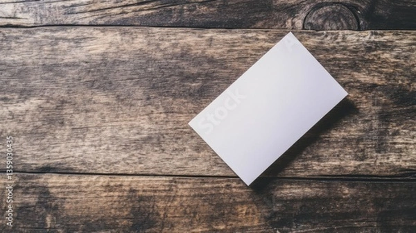Fototapeta blank white business card mockup on rustic wooden background