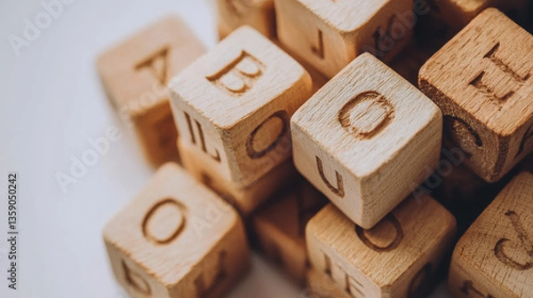 Obraz Educational Wooden Blocks with Engraved Letters: A Classic Tool for Learning and Play