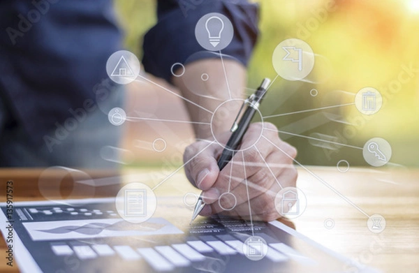 Fototapeta businessman hand working with new modern computer and business s