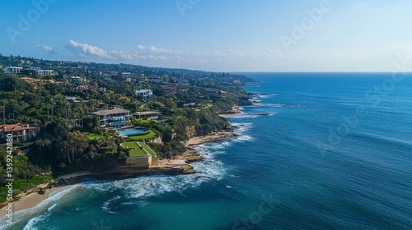 Fototapeta Grand oceanfront estate, multi-tiered terraces with uninterrupted sea views, lush grounds with private beach access, panoramic aerial composition, sunny day.  