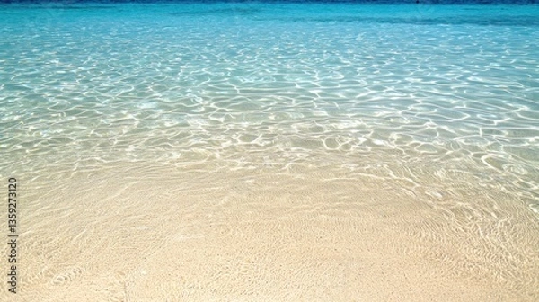 Obraz Crystal Clear Ocean Water Gently Laps Against the Sandy Shore