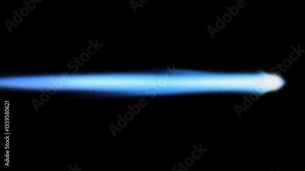 Fototapeta Grain noise texture Intense blue flame with a dark background