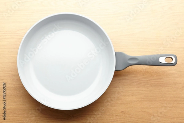 Fototapeta Frying pan isolated on white background with shadow