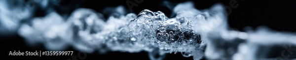 Fototapeta Water Stream with Bubbles and Vapor