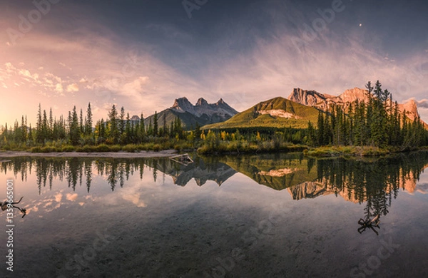 Fototapeta Panorama of Three sisters mountain reflection on pond at sunrise in autumn at Banff national park