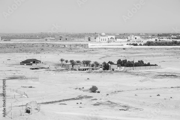 Obraz View of the small village Raghba with a mosque in the middle of the desert in Saudi Arabia