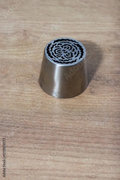 Fototapeta Tip for making marshmallow tulips. Pastry tip made of metal. Close-up