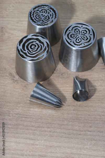 Fototapeta Set of pastry tips made from stainless steel. Tips for making marshmallow tulips and classic marshmallows. Close-up.