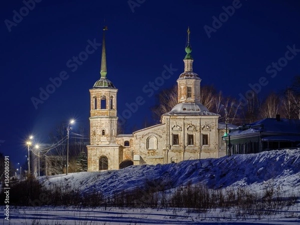 Obraz Ancient orthodox church in Veliky Ustyug at sunset.