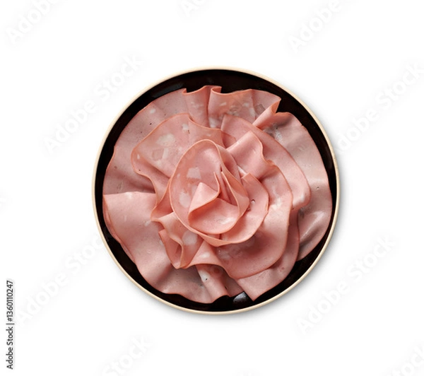 Obraz Fette di mortadella su piatto nero, visto dall'alto e isolato su sfondo bianco.