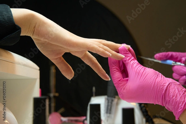 Obraz Nails manicure with file. Woman beautiful nail care. after filling.