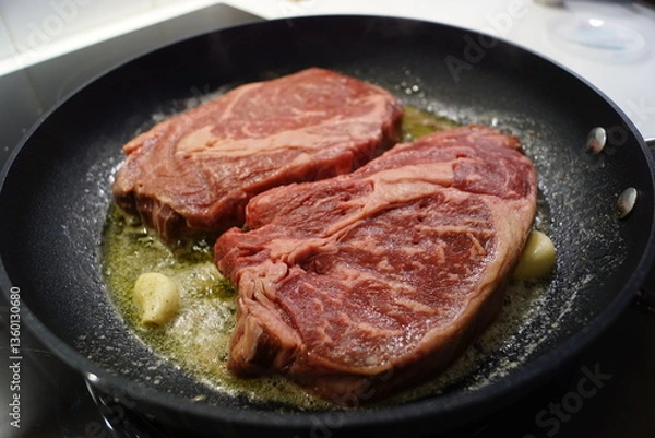Obraz Close up of a juice beef steak being cooked 