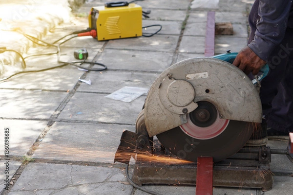 Obraz The technician is using a steel cutter