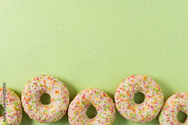 Fototapeta donuts on green background