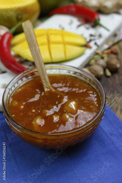 Obraz Bowl of homemade Mango Chutney on old wooden table