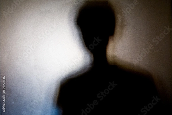 Obraz person shadows with Frosted glass - violations concept background