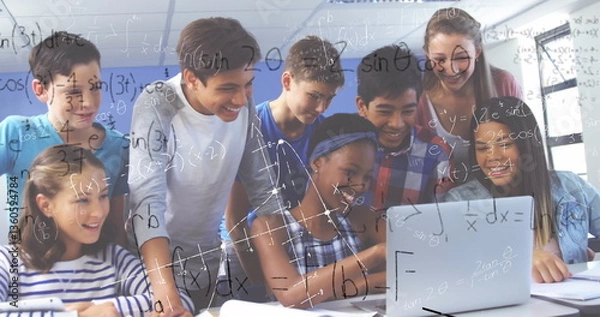 Fototapeta In school, diverse students collaborating on laptop, solving math problems together