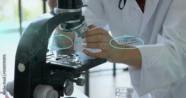 Fototapeta Scientist using microscope in lab, focusing on research with mathematical equations