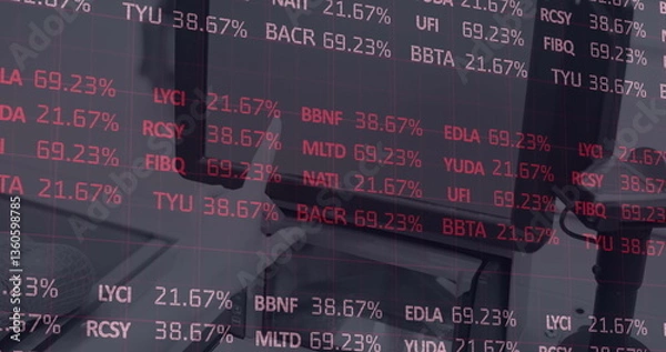 Fototapeta Digital image of stock market data processing against mid section of person using digital tablet