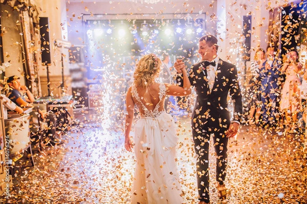 Obraz brides wedding party in the elegant restaurant with a wonderful light and atmosphere