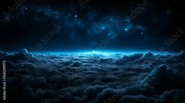 Fototapeta Above the clouds, a vibrant blue nebula shines in the dark night sky.