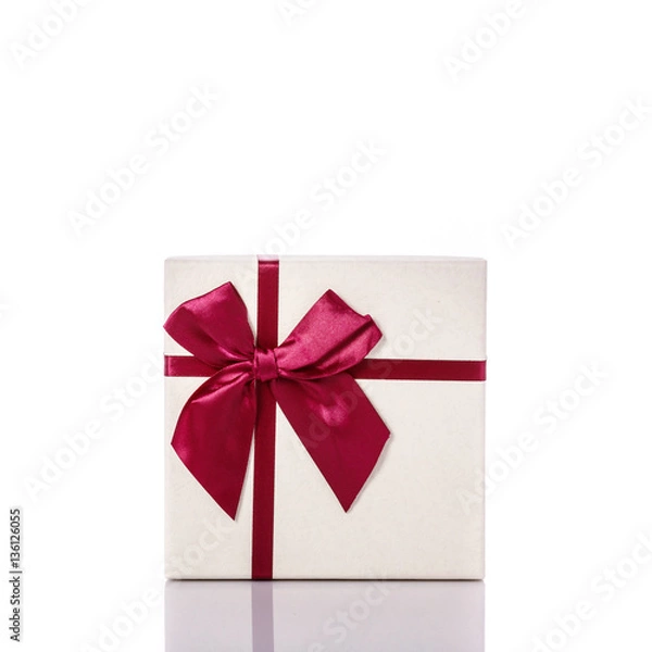 Fototapeta New color gift box with ribbon. Studio shot isolated on white