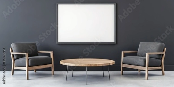 Fototapeta Two gray armchairs flank a round table under a framed art