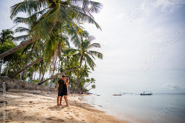 Obraz zakochana para na egzotycznej plaży