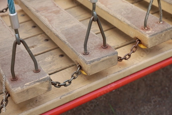 Obraz children's suspended wooden staircase on the playground, close-up of the attraction