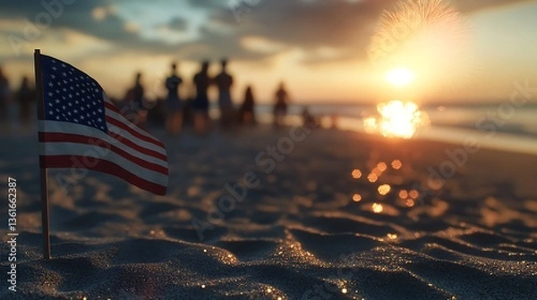Fototapeta American Flag on Sandy Beach at Sunset with Blurred Crowd in Background


