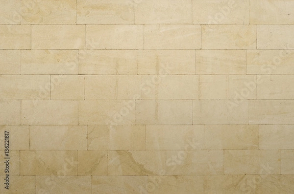Obraz Background of gray-yellow porous sandstone blocks