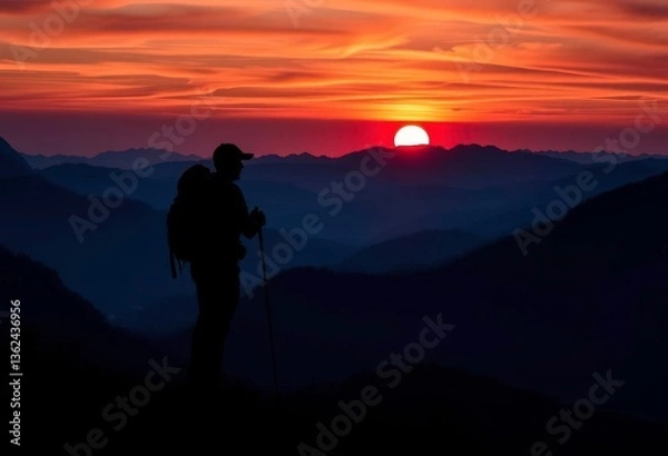 Fototapeta Silhouette of hiker with backpack, sunset mountain vista, wonder, climbing