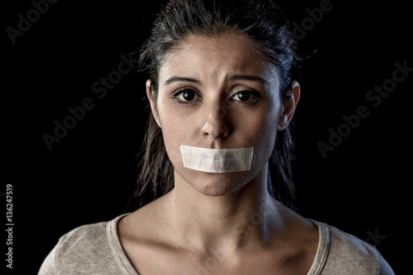 Obraz close up portrait of young attractive woman with mouth and lips sealed in adhesive tape restrained
