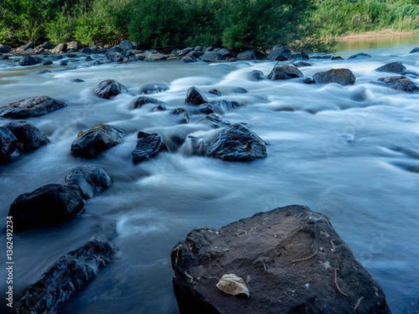 Fototapeta River of Time: Rocks and Flowing Water