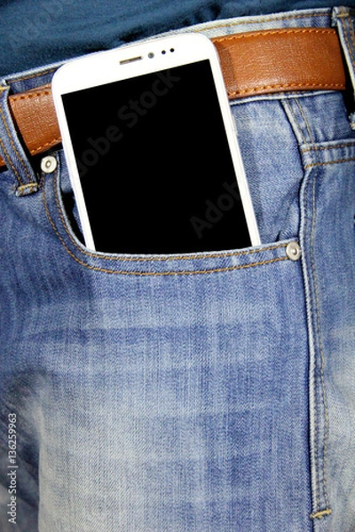 Obraz Smartphone in your pocket jeans. Texture, background.