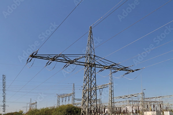 Obraz Electricity pylon on an overland route in Germany against a blue sky