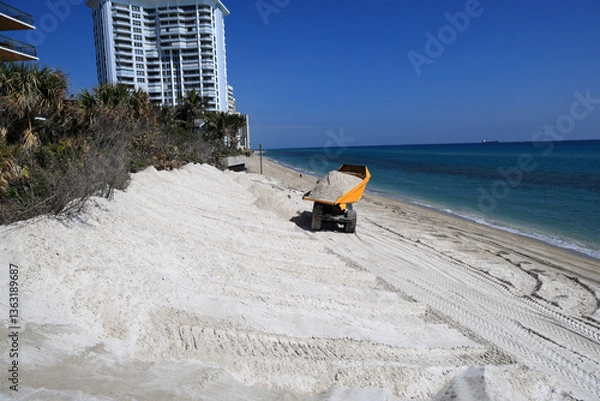 Obraz Beach erosion has required a sand replenishment project to be implemented in Florida on the Atlantic Ocean.  An entire sand dune had eroded over the last 5 years.